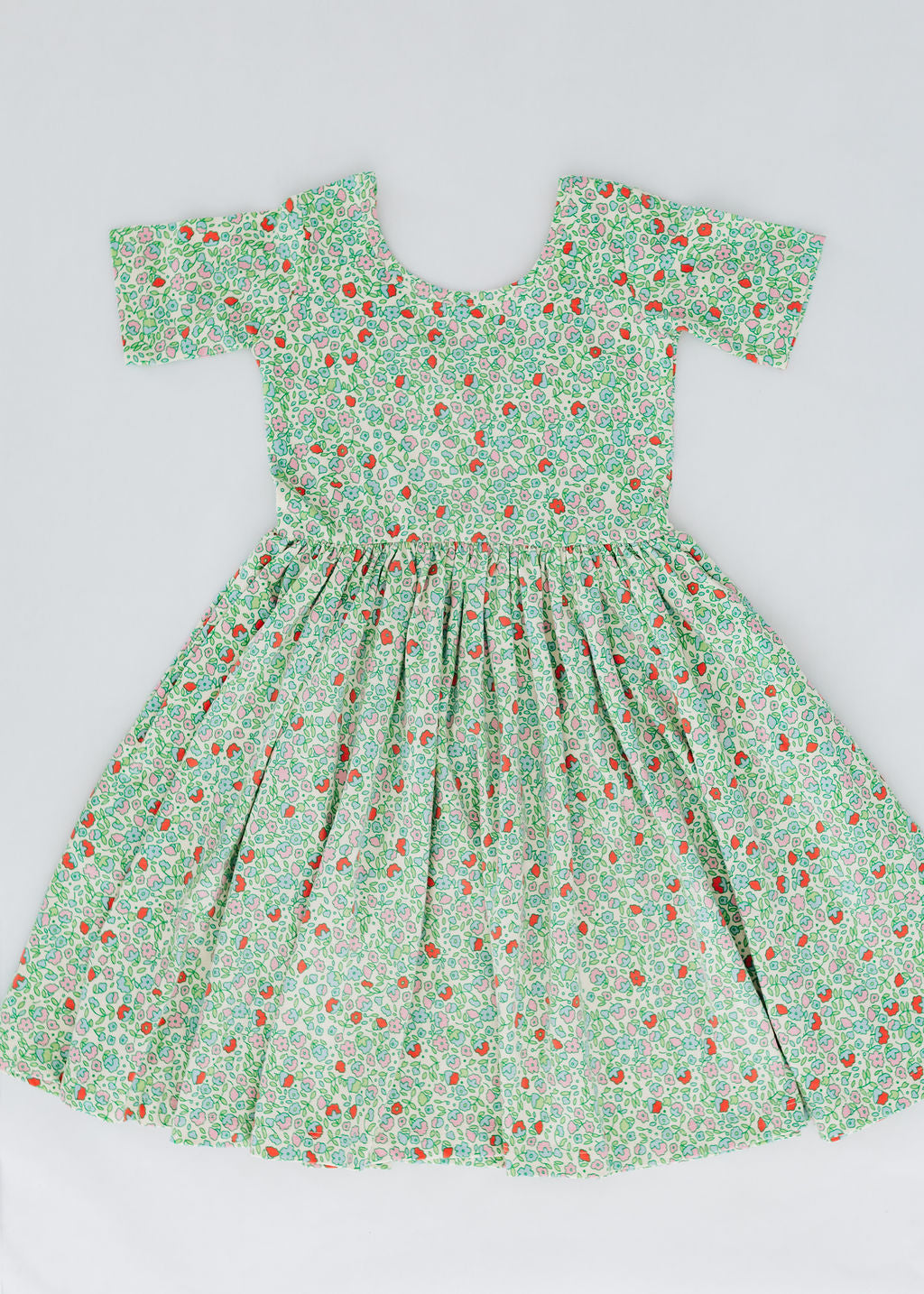 Short Sleeve Twirl Dress in Spring Green Floral Good Apples Kids Short Sleeve Twirl Dress in Spring Green Floral Good Apples Kids